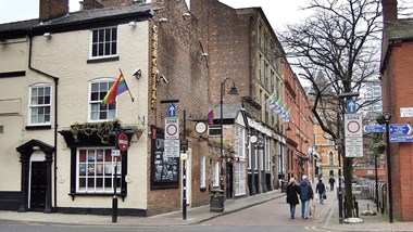 People walking along Canal Street in Manchester