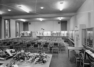 Interior view showing parts of prosthetic limbs on a table at Queen Marys Hospital.