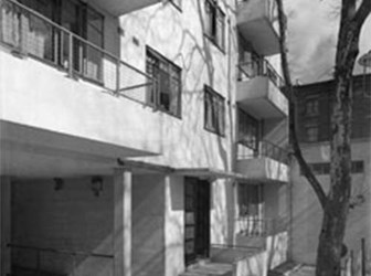 Kensal House Estate, 1936, public housing designed to banish slums. Each flat had a balcony for drying washing, a second for leisure