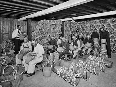 TT Nethercoat, Burnham-on-Crouch, Essex. Workers probably making canvas water buckets for the army