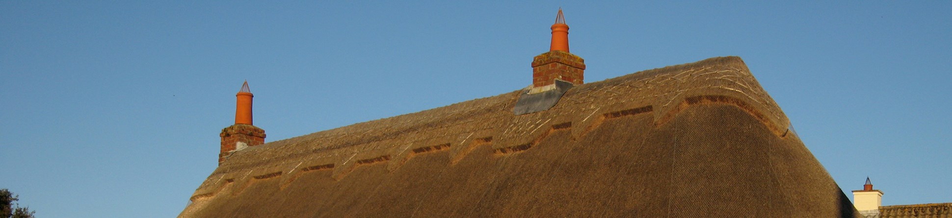 Photo of a thatched cottage