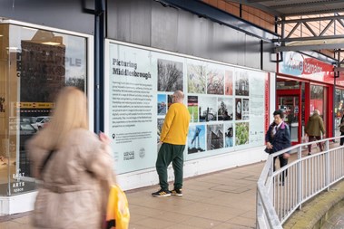 A man looking at a window installation.