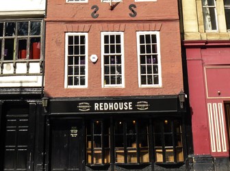 A square of view of the front of the Redhouse pub in Newcastle, UK